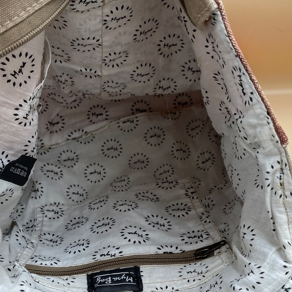 Myra Canvas Cafe Print Backpack in Beige and Brown Weathered Worn Look Myra